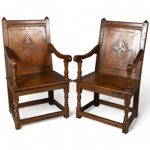 244 - A Pair of 18th/19th century oak armchairs, with carved back panel and turned front legs, height 103c... 