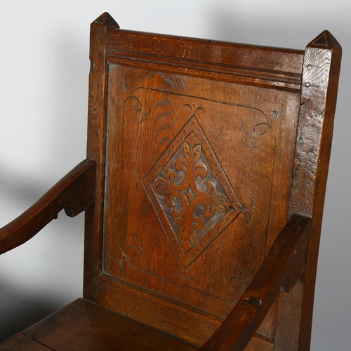 244 - A Pair of 18th/19th century oak armchairs, with carved back panel and turned front legs, height 103c... 