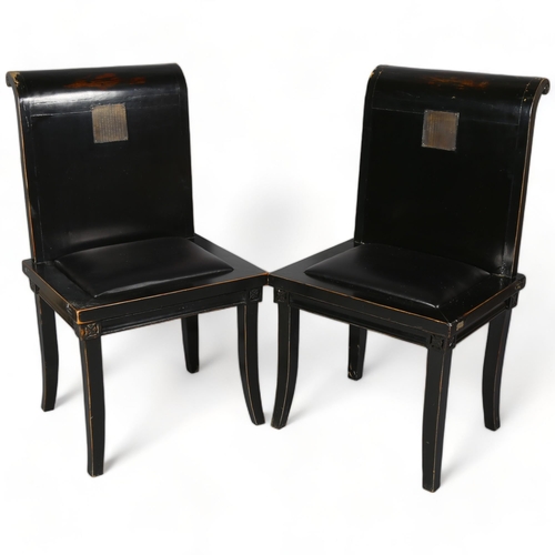 245 - A pair of 20th century Chinese hardwood black lacquer chairs, insert brass plates in back with engra... 