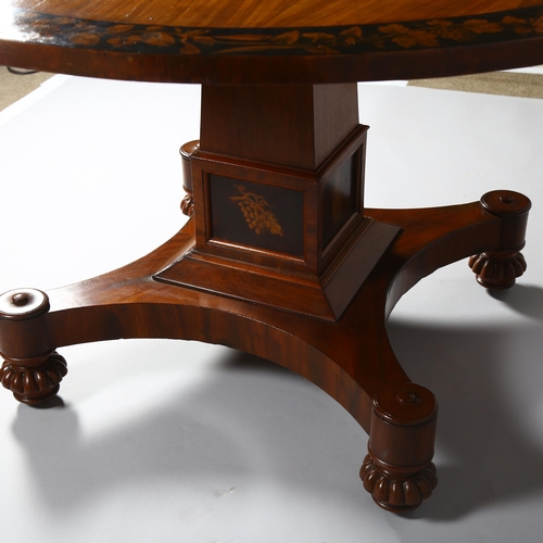 249 - A Late Victorian mahogany centre table, with veneer fringe and panels on stem decorated with fruit a... 