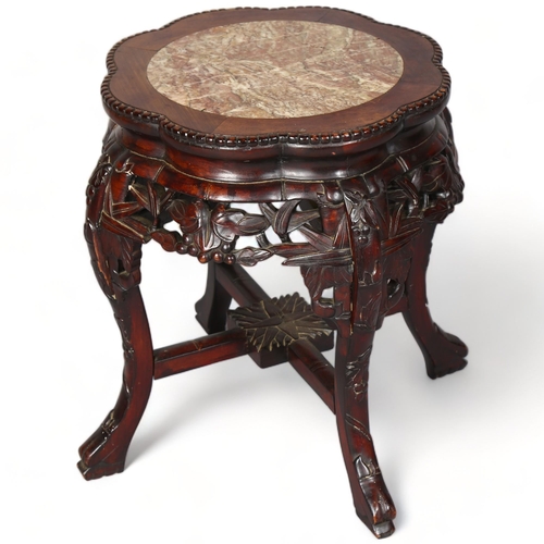 261 - A Chinese marble top padouk jardiniere stand, height 47cm