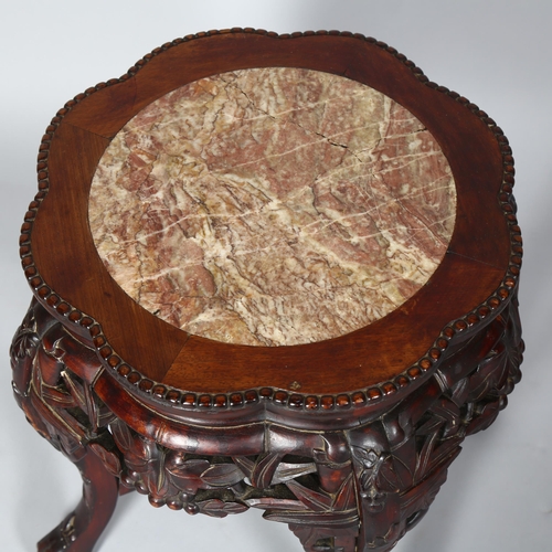 261 - A Chinese marble top padouk jardiniere stand, height 47cm