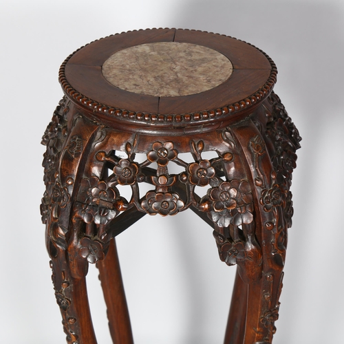 262 - A tall Chinese antique marble topped padouk jardiniere stand, with blossom carved decoration, height... 