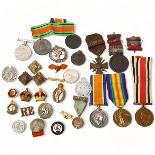 275 - First World War medals to Pte AJ Jones S.A.I, and a number of other medals, coins and badges, Croix ... 