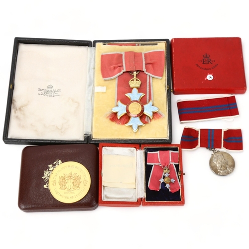 287 - A Commander Of The Order Of The British Empire (C.B.E.) medal inscribed For God and The Empire, toge... 