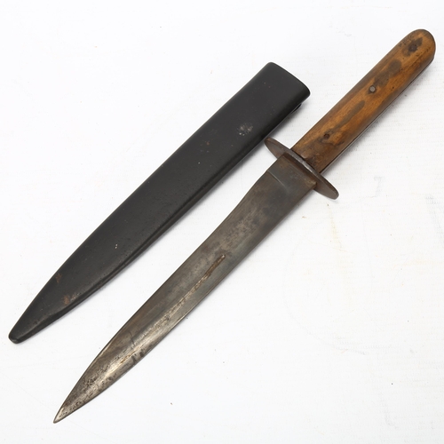 59 - A WW I period Austro-Hungarian trench knife, in metal sheath, length 32.5cm