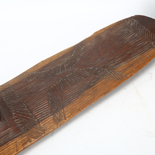 68 - A 19th/20th century Australian Aboriginal hardwood shield, with Wunda style carved decoration, lengt... 