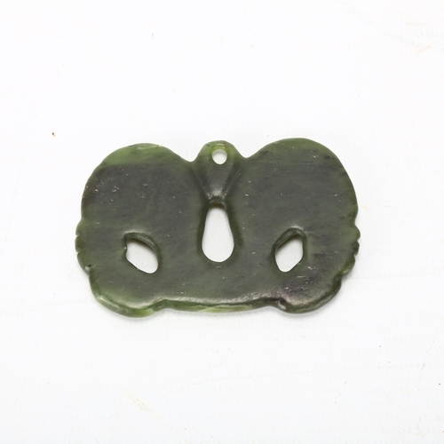 69 - A Maori, New Zealand pounamu stone carved pendant, in Pekapeka (native bat) form, length 7cm