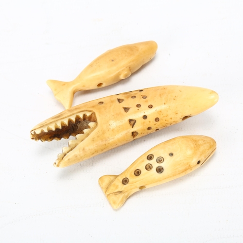 70 - Three Inuit whale bone or tooth carvings, in varied whale forms, longest 8.5cm