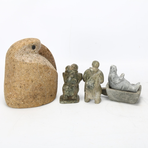 72 - An Inuit granite carving of a bird, height 15cm and three greenstone carved figures