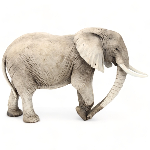 74 - Nick Mackman, raku ceramic Elephant sculpture,  2013, height 34cm, length including tusks 50cm