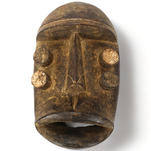 77 - A Grebo, Ivory Coast wood carved mask, height 31cm