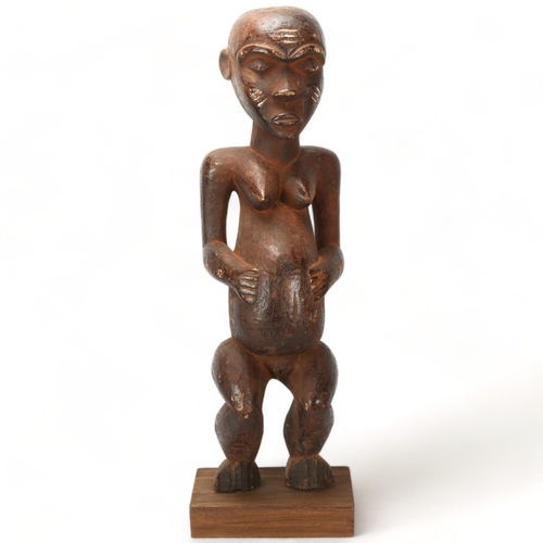 80 - An 19th century Congo wood carved female figure, height 65cm