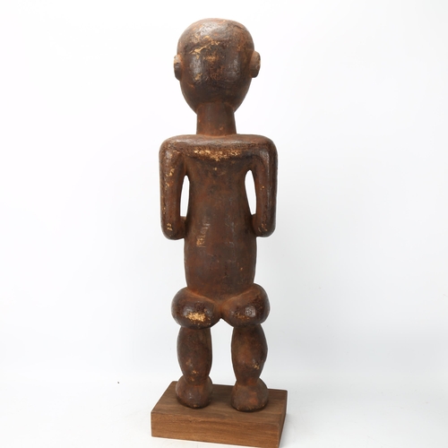 80 - An 19th century Congo wood carved female figure, height 65cm