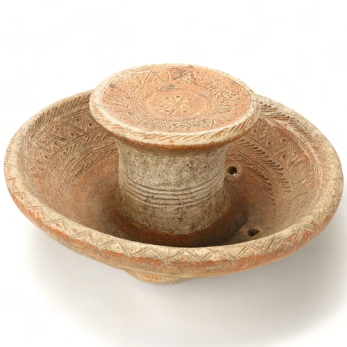 82 - A Djenne, Mali terracotta bathing stool, with sgraffito decoration, diameter 44cm