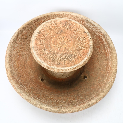 82 - A Djenne, Mali terracotta bathing stool, with sgraffito decoration, diameter 44cm