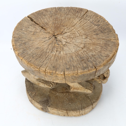 84 - An antique West African hardwood stool with carved Aardvark figure, height 24cm