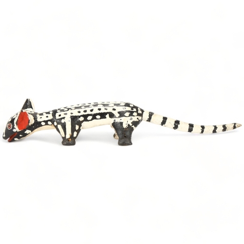 87 - A Bozo, Mali wood carved and painted Hyena, length 62cm