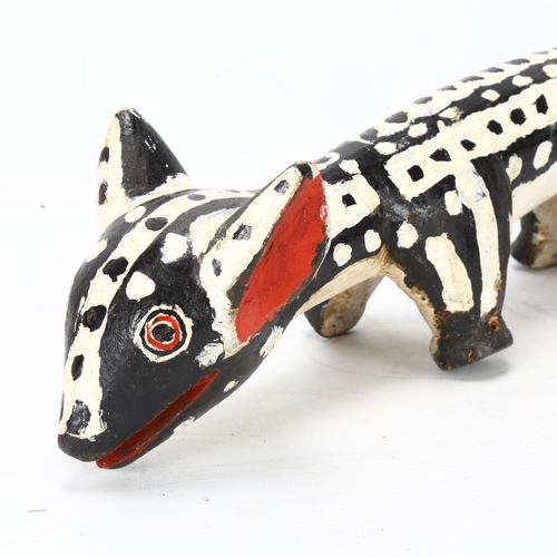 87 - A Bozo, Mali wood carved and painted Hyena, length 62cm