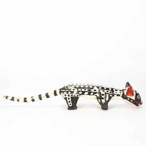 87 - A Bozo, Mali wood carved and painted Hyena, length 62cm