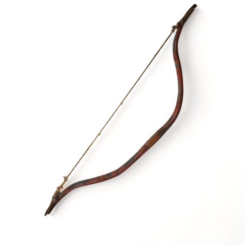 94 - A traditional Mongolian bow,  wood construction with painted chevron detail and leather strapping, l... 