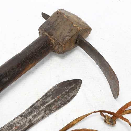 95 - Three African handmade tools, a carving adze, a steel tool in leather sheath and a Congo Knife, long... 