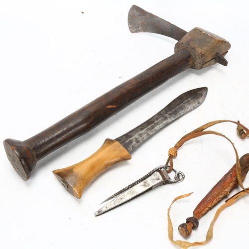 95 - Three African handmade tools, a carving adze, a steel tool in leather sheath and a Congo Knife, long... 