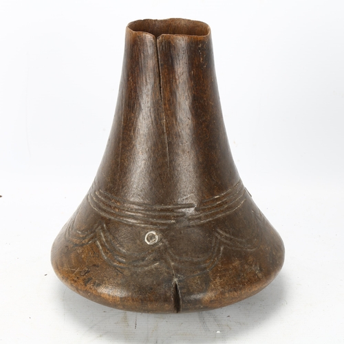 97 - A Hima, Uganda carved wood milk pot, height 23cm