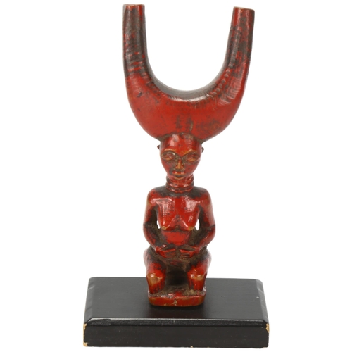 99 - A Baule, Ivory Coast catapult, carved wood female figure on wooden plinth, height 16cm