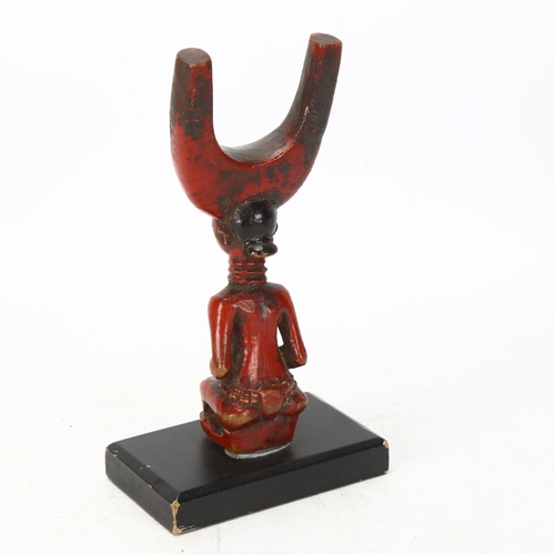 99 - A Baule, Ivory Coast catapult, carved wood female figure on wooden plinth, height 16cm