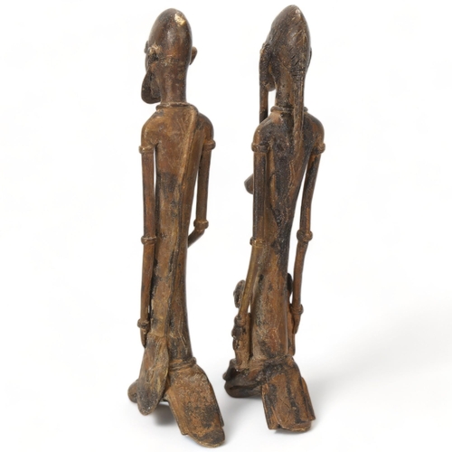 78G - Two Dogon, Ghana, copper figures, a male warrior and woman with children, height 32cm