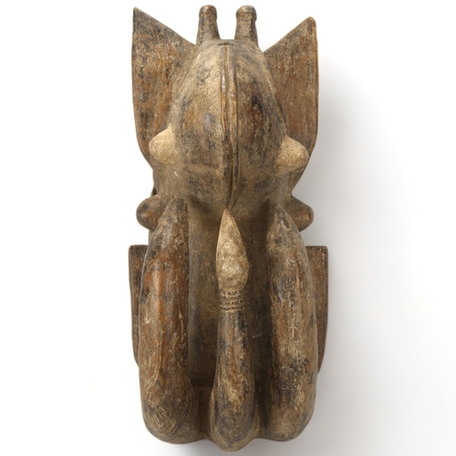 78C - A Jimini (Djimini), Ivory Coast wood carved mask, height 40cm