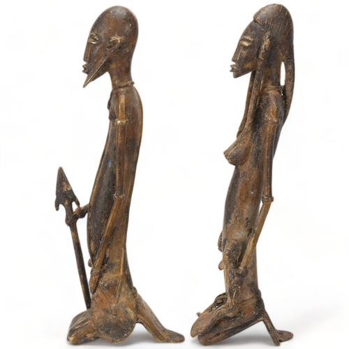 78G - Two Dogon, Ghana, copper figures, a male warrior and woman with children, height 32cm