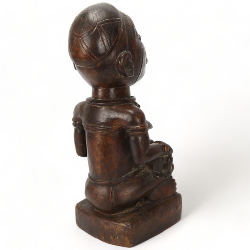 78I - A Bakongo, Angola, wood carved figure of mother and child, height 38cm