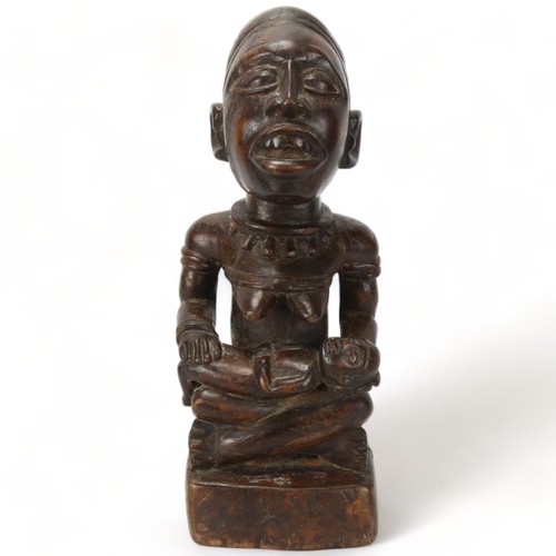 78I - A Bakongo, Angola, wood carved figure of mother and child, height 38cm