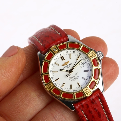 1037 - BREITLING - a lady's bi-metal Lady J quartz calendar wristwatch, ref. D52065, white dial with gilt l... 