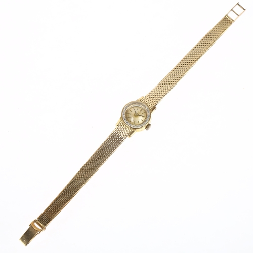 1038 - OMEGA - a lady's gold plated mechanical bracelet watch, ref. 511.166, circa 1965, silvered dial with... 