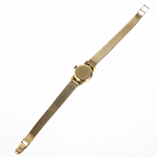 1038 - OMEGA - a lady's gold plated mechanical bracelet watch, ref. 511.166, circa 1965, silvered dial with... 