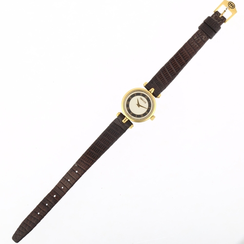 1041 - GUCCI - a lady's gold plated 2000L quartz wristwatch, circa 1994, silvered dial with black chapter r... 