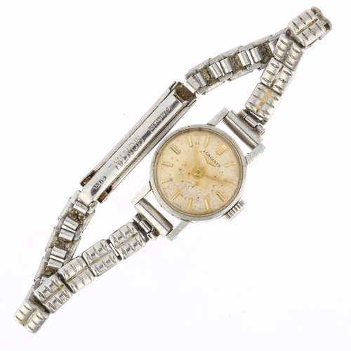 1048 - LONGINES - a lady's stainless steel mechanical bracelet watch, circa 1960s, silvered dial with appli... 