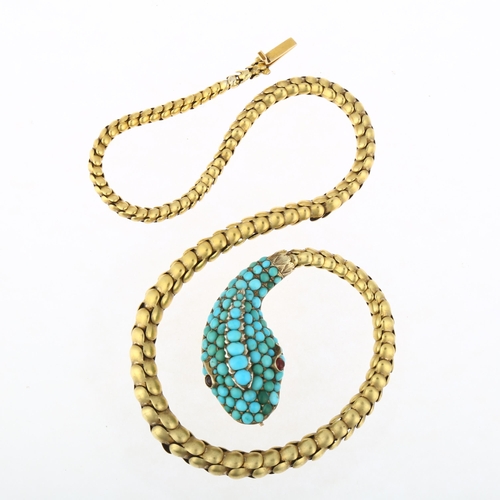 1101 - A fine Victorian turquoise and garnet snake necklace, circa 1860, the large head pave set with caboc... 