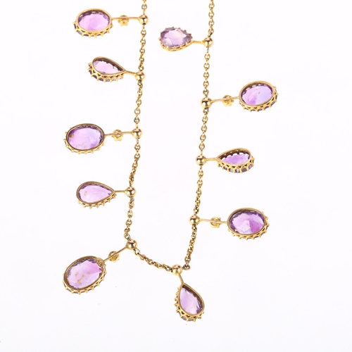 1108 - An Edwardian amethyst and split pearl fringe necklace, circa 1910, each offset drop claw set with ov... 