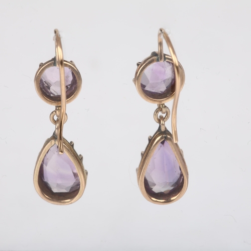 1110 - A pair of Edwardian amethyst drop earrings, cut-down collet set with pear and round-cut amethysts wi... 