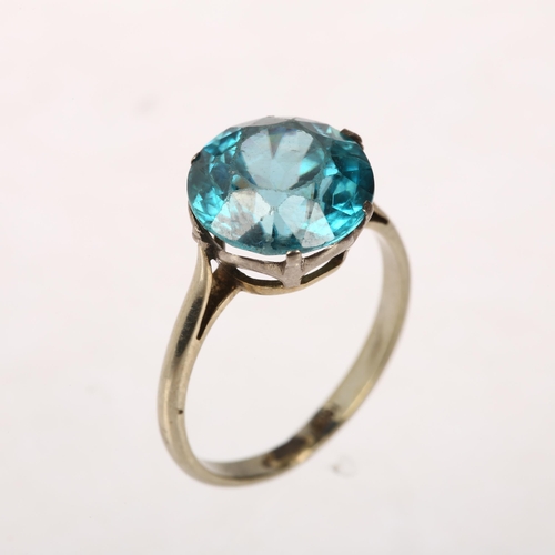 1113 - An Art Deco 18ct white gold solitaire blue zircon ring, claw set with round-cut zircon, measures app... 