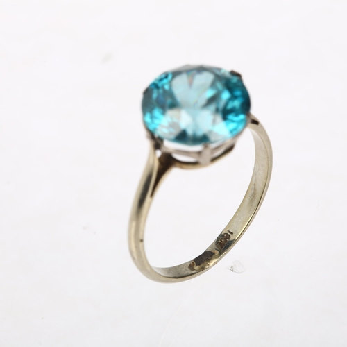 1113 - An Art Deco 18ct white gold solitaire blue zircon ring, claw set with round-cut zircon, measures app... 