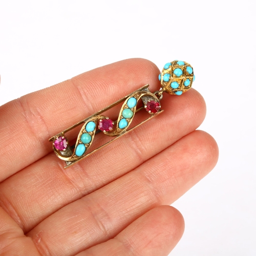 1118 - A Victorian ruby and turquoise openwork drop brooch, claw set with round-cut rubies and cabochon tur... 