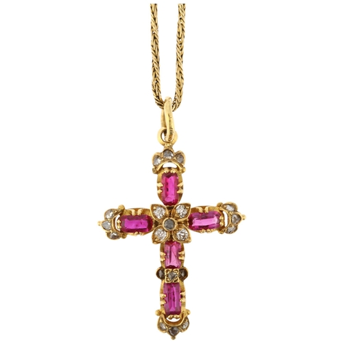 1136 - A Victorian ruby and diamond cross pendant necklace, circa 1860, set with oval-cut rubies with rose ... 