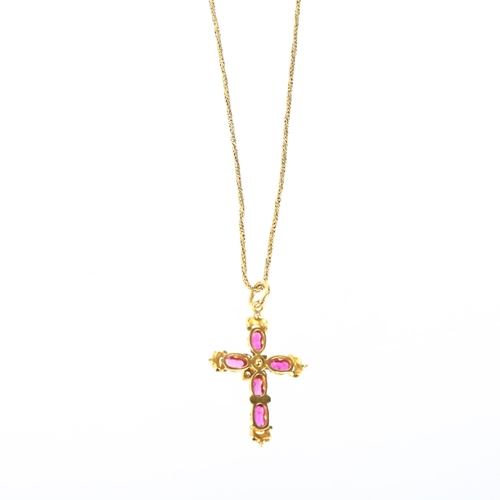 1136 - A Victorian ruby and diamond cross pendant necklace, circa 1860, set with oval-cut rubies with rose ... 