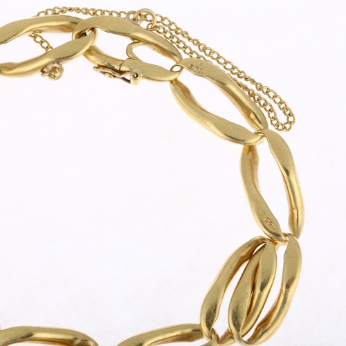 1165 - A heavy 18ct gold elongated curb link chain bracelet, maker S&S, London 1979, 18cm, 40.1g