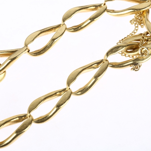 1165 - A heavy 18ct gold elongated curb link chain bracelet, maker S&S, London 1979, 18cm, 40.1g